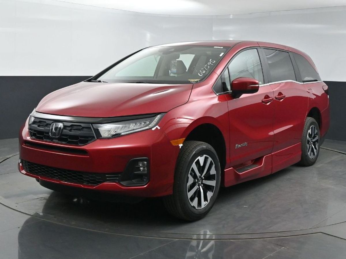 Red Honda Odyssey image number 2