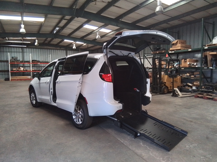 White Chrysler Pacifica with Rear Entry Manual Fold Out ramp