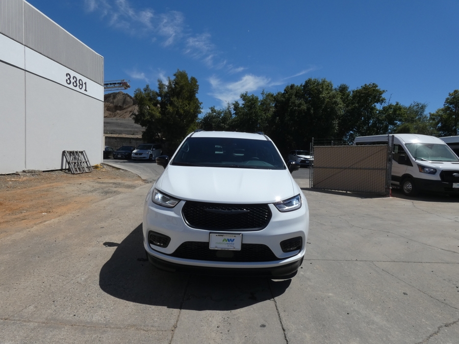 White Chrysler Pacifica with Side Entry Automatic In Floor ramp