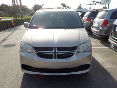 Número de imagen de Dodge Grand Caravan dorado 1