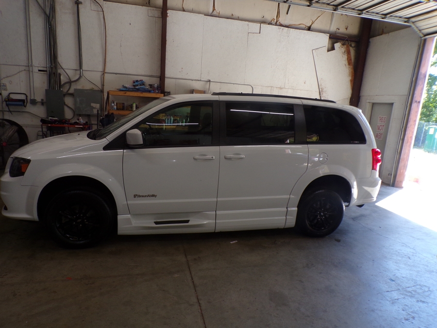 White Dodge Grand Caravan with Side Entry Automatic Fold Out ramp