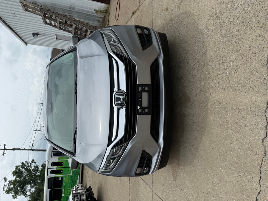 Silver Honda Odyssey with Side Entry Automatic In Floor ramp