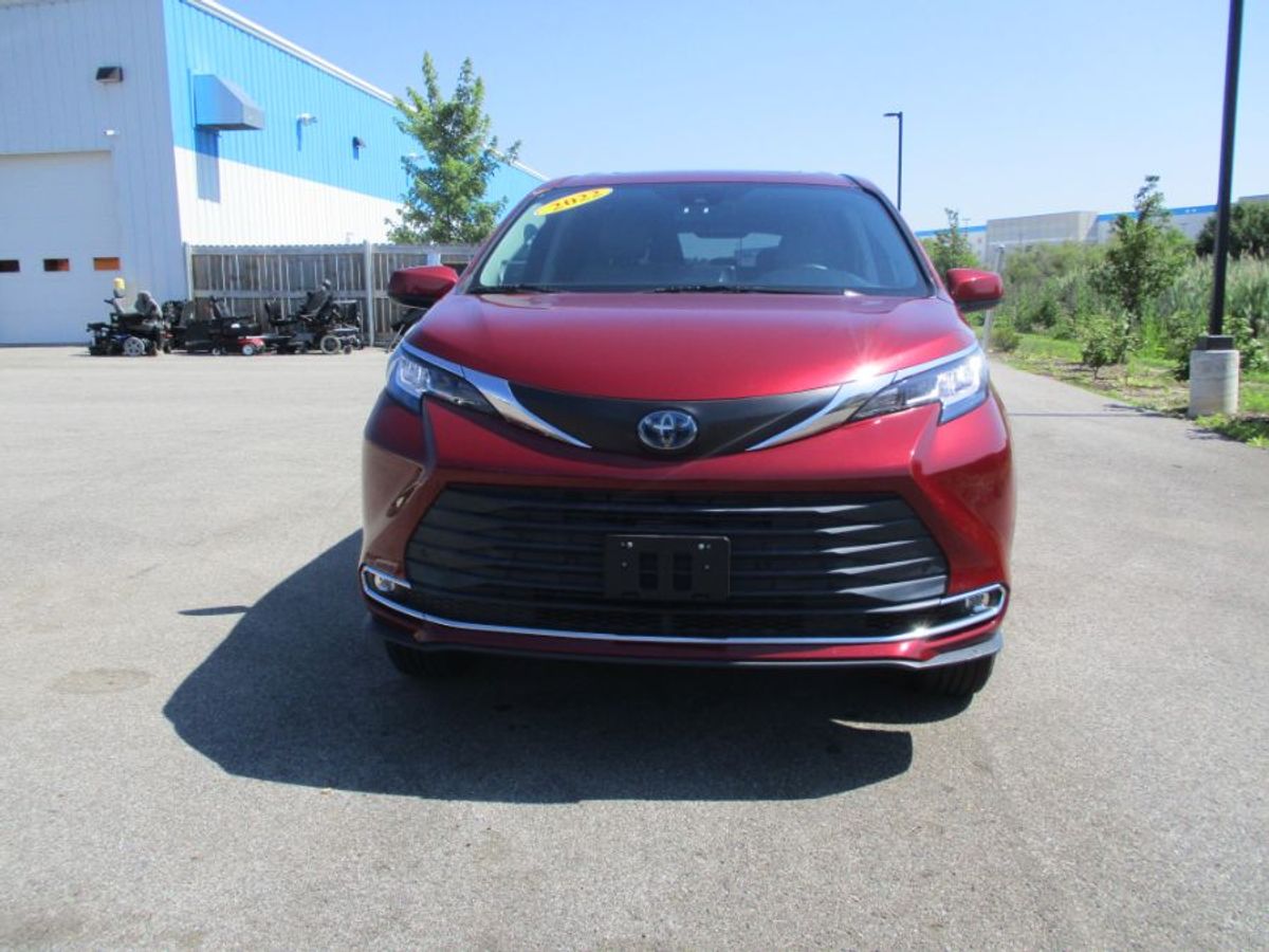 Red Toyota Sienna with Side Entry Automatic Fold Out ramp