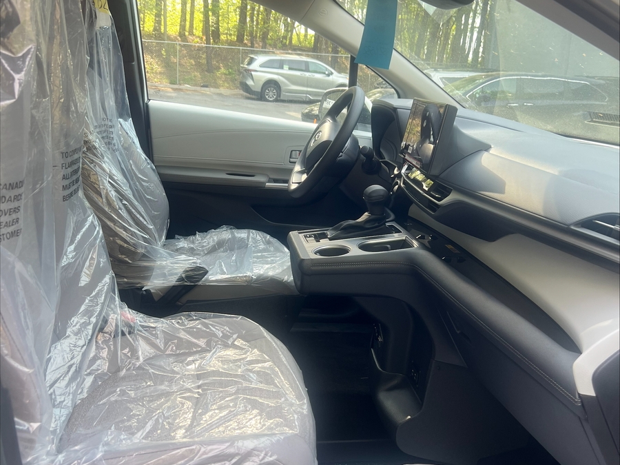 White Toyota Sienna with Side Entry Manual In Floor ramp