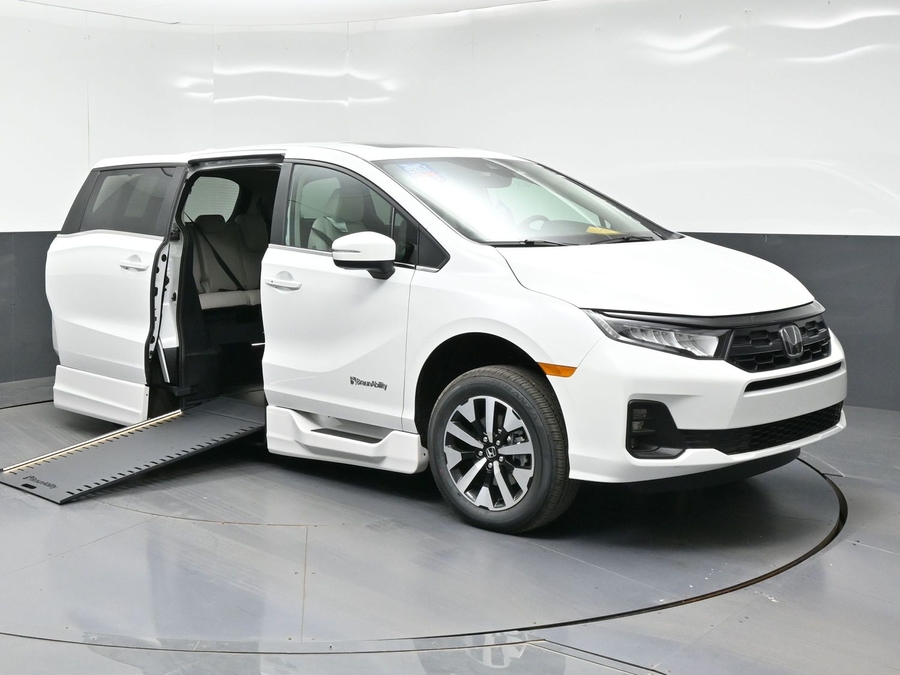 White Honda Odyssey with Side Entry Automatic In Floor ramp