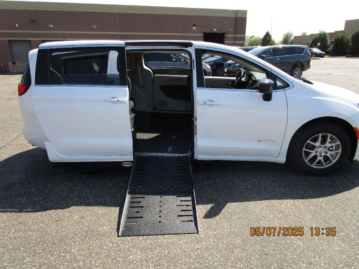 White Chrysler Voyager with Side Entry Automatic Fold Out ramp