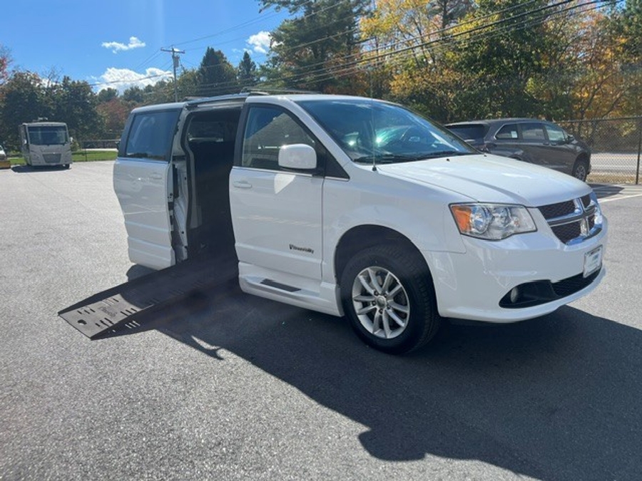 White Dodge Grand Caravan with Side Entry Automatic Fold Out ramp