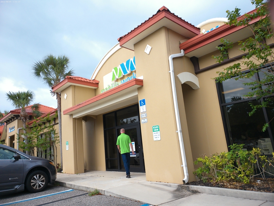 Black Chrysler Pacifica with Side Entry Automatic Fold Out ramp