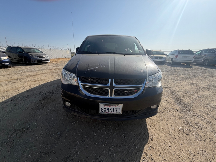 Black Dodge Grand Caravan image number 1