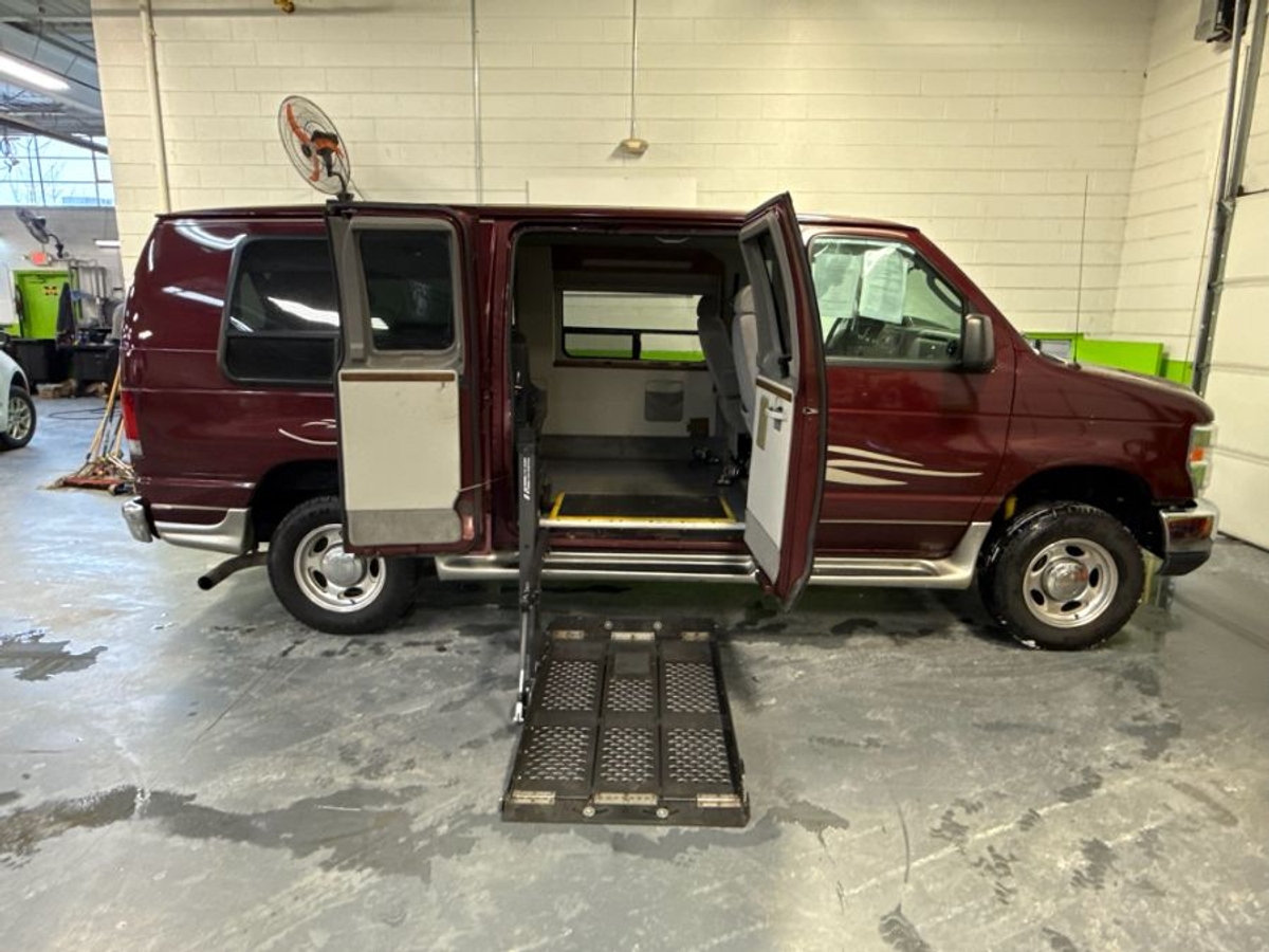 Red Ford E-Series with Side Entry Automatic Fold Out ramp