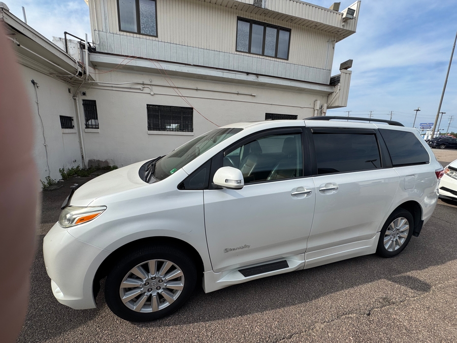 White Toyota Sienna with Side Entry Automatic In Floor ramp