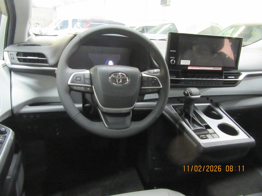 Silver Toyota Sienna with Side Entry Automatic In Floor ramp