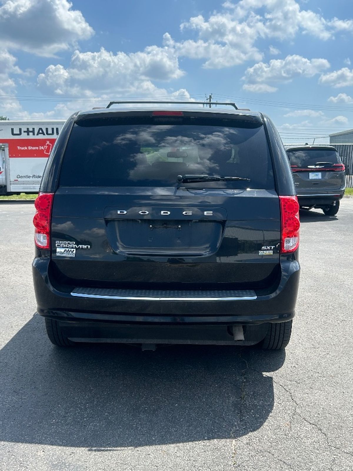 Black Dodge Grand Caravan image number 9