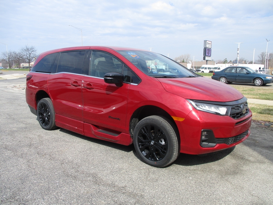 Red Honda Odyssey image number 7
