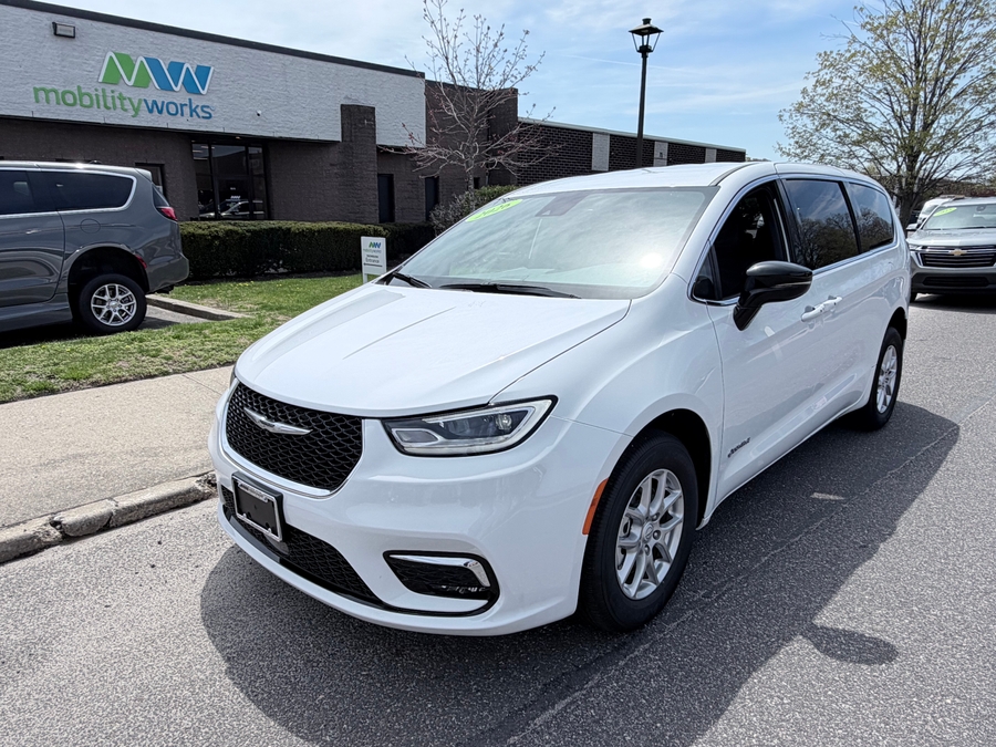 White Chrysler Pacifica with Side Entry Automatic Fold Out ramp