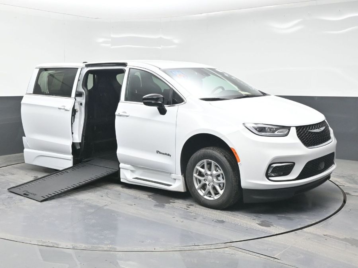 White Chrysler Pacifica with Side Entry Automatic In Floor ramp