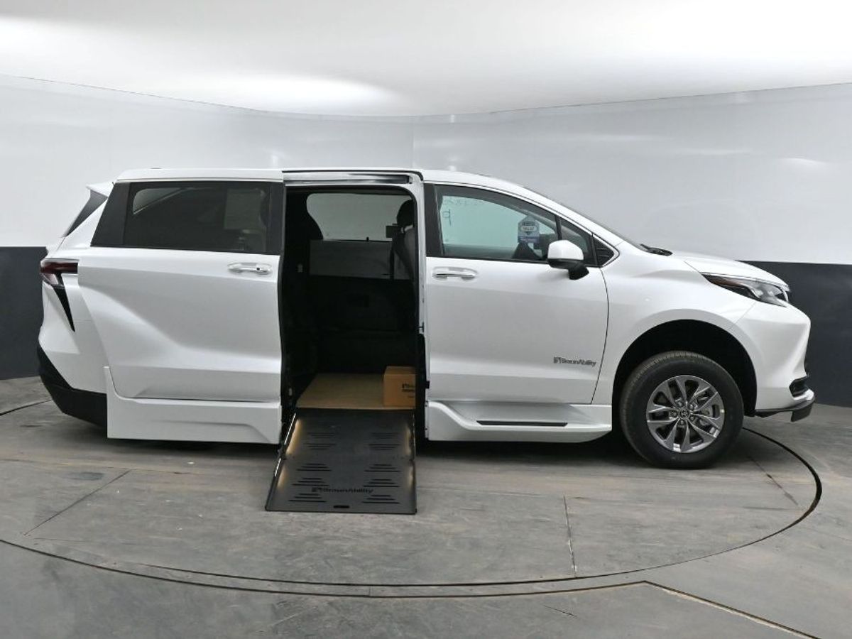 White Toyota Sienna with Side Entry Automatic Fold Out ramp
