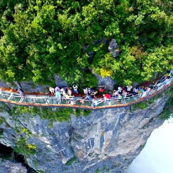 Desafiando las Alturas del Monte Tianmen y la Cultura Tujia