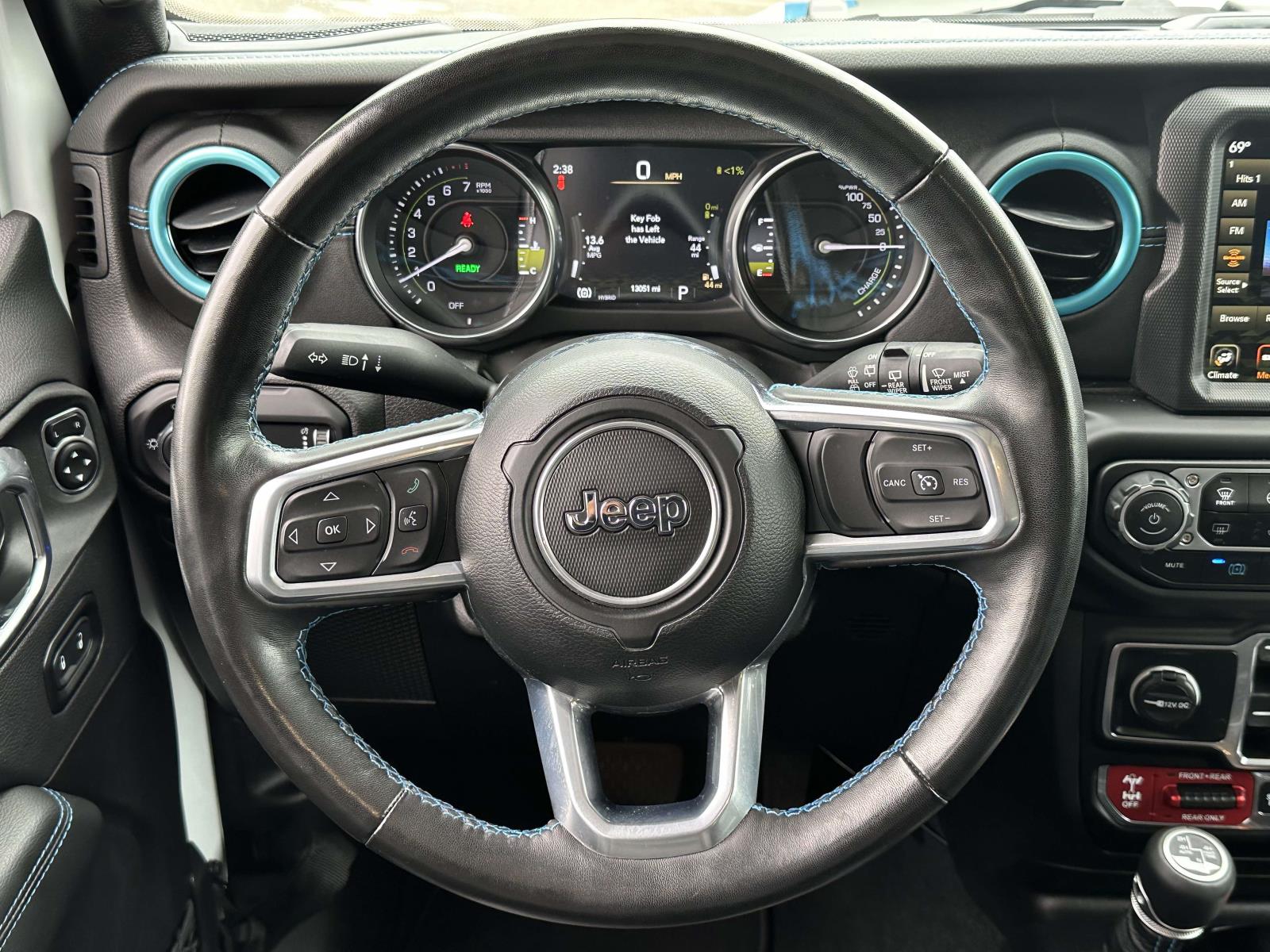 used 2023 Jeep Wrangler 4xe car, priced at $32,809