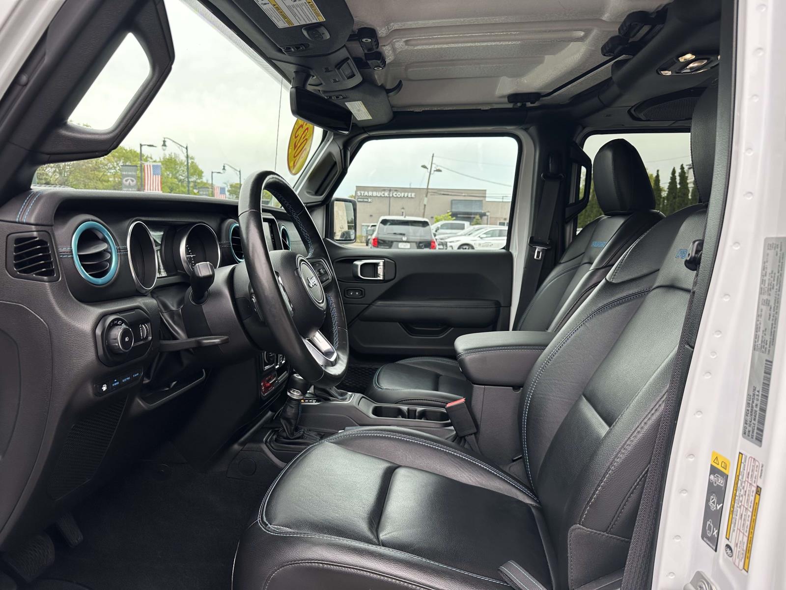 used 2023 Jeep Wrangler 4xe car, priced at $32,809
