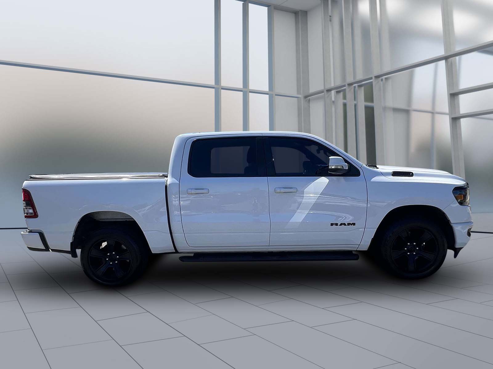 used 2020 Ram 1500 car, priced at $27,045
