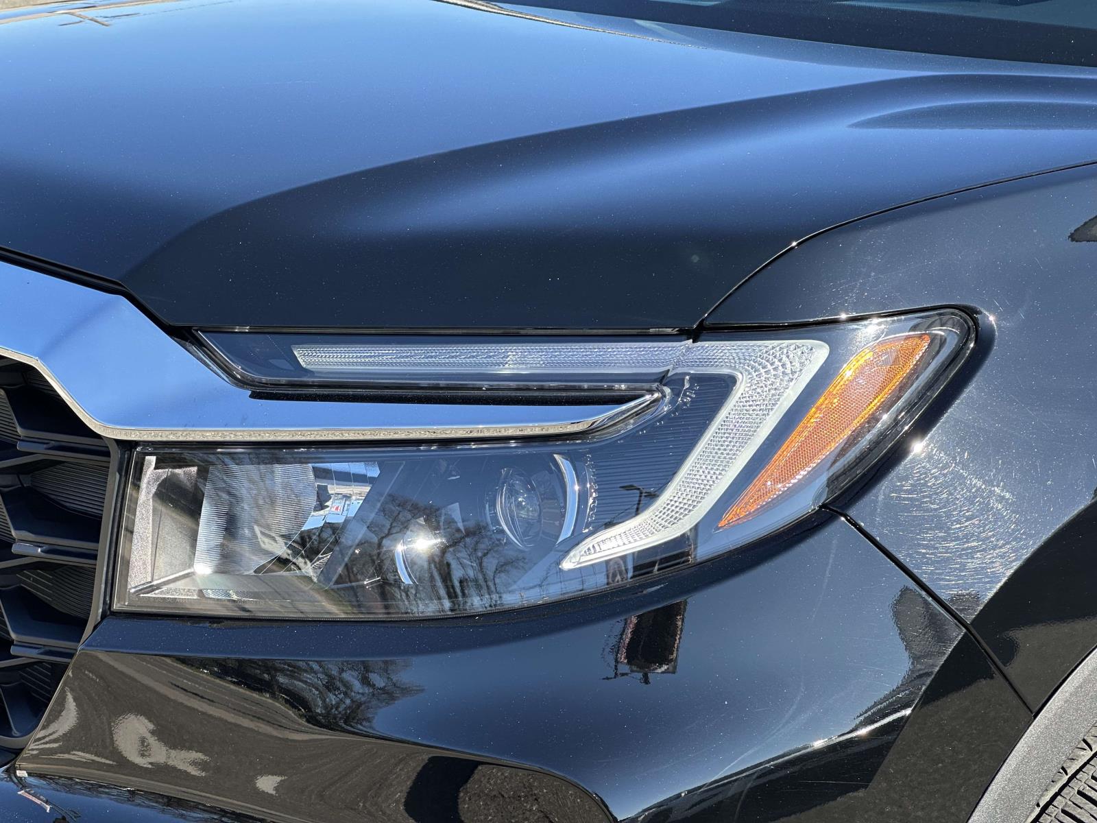 used 2023 Honda Passport car, priced at $30,999