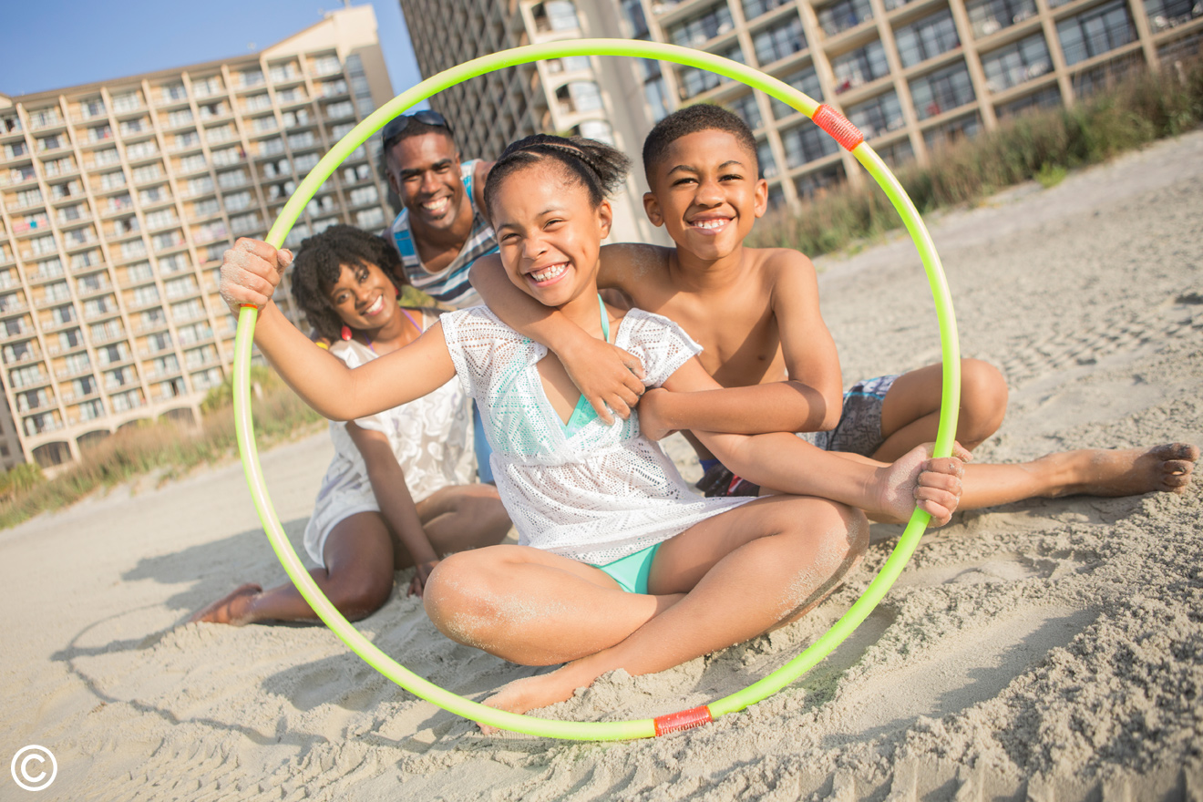 Family at Beach Cove Resort in North Myrtle Beach, SC in the fall.