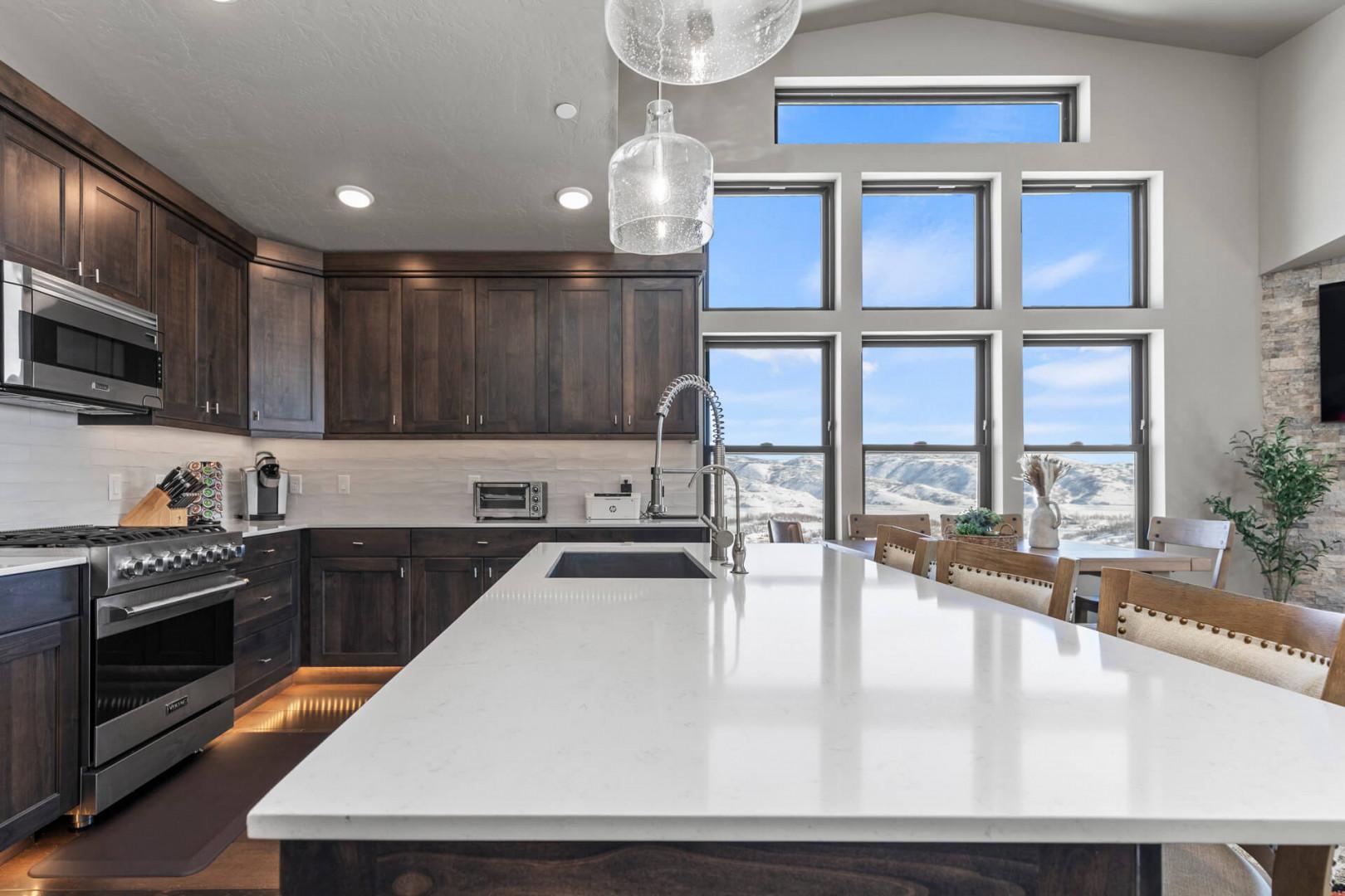 Sleek countertop with modern appliances, perfect for culinary creations.