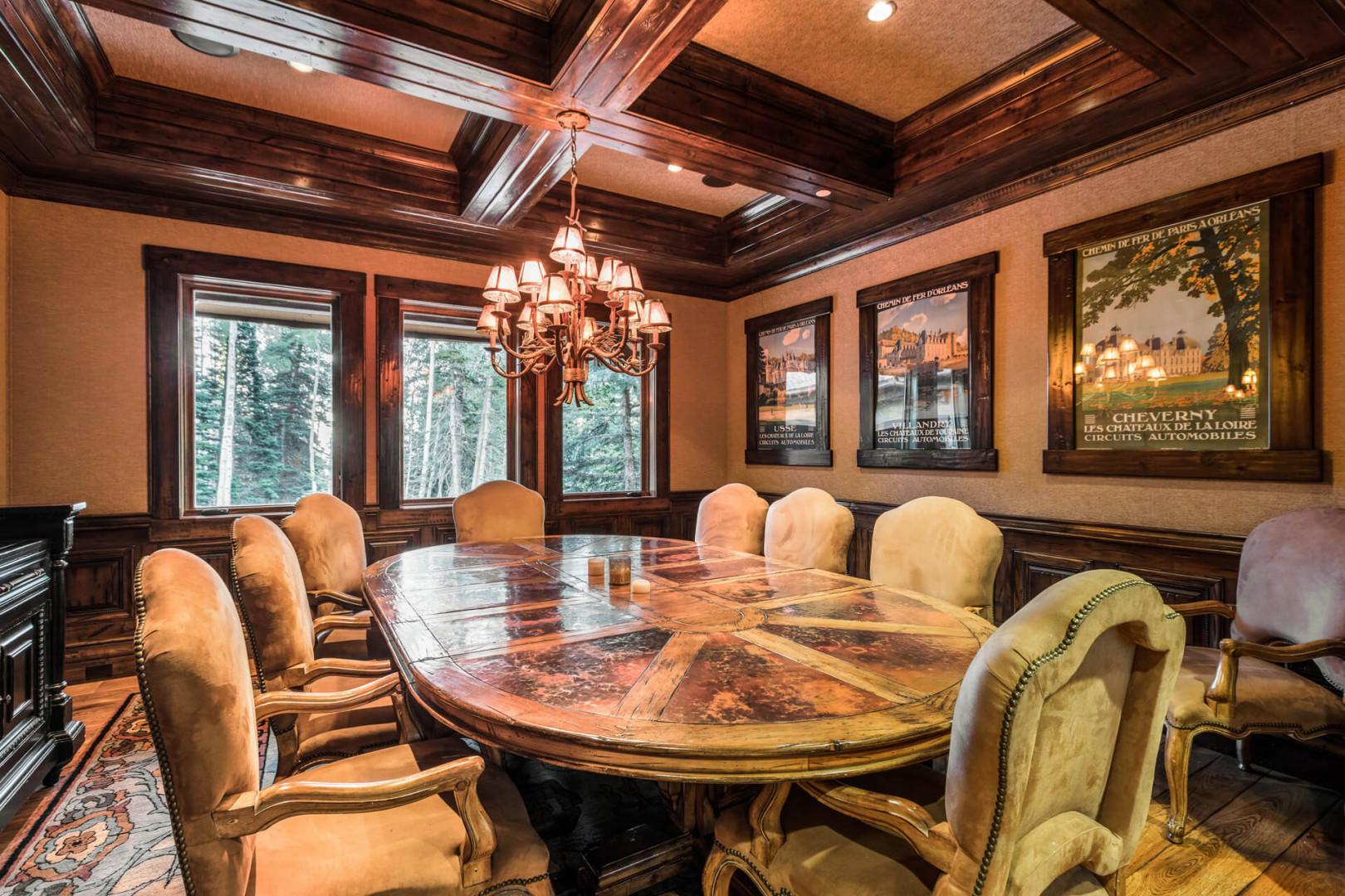 Gorgeous wooden table surrounded by cozy chairs in a stylish setting.