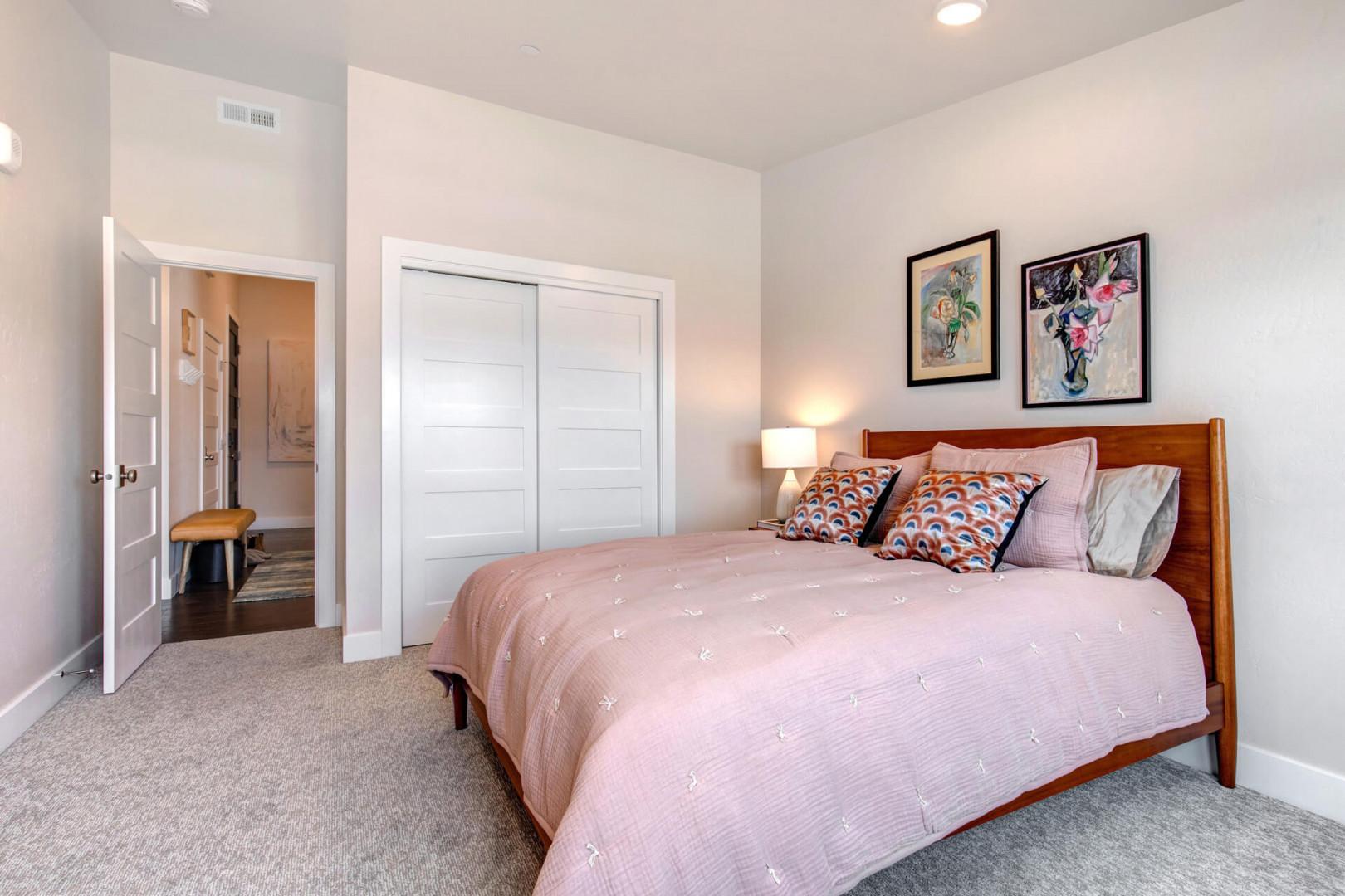 Cozy corner with a comfortable bed and spacious closet.