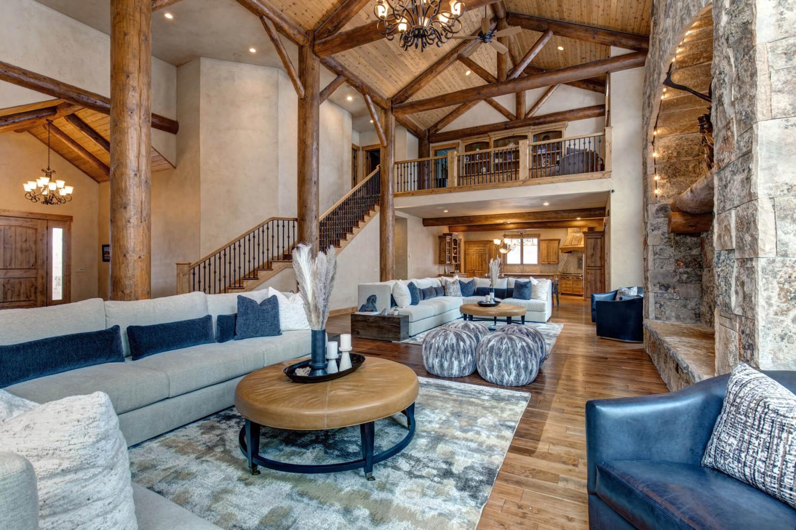 Living Room: "Modern design with cozy fireplace and abundant natural light."