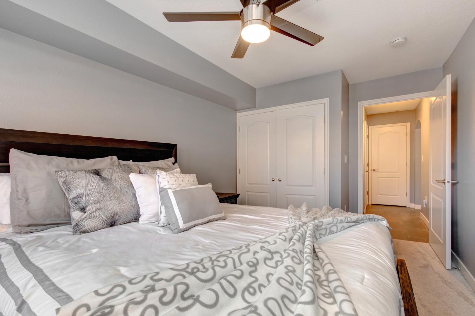 Fox Bay H101: Cozy bed next to a spacious closet for your convenience.