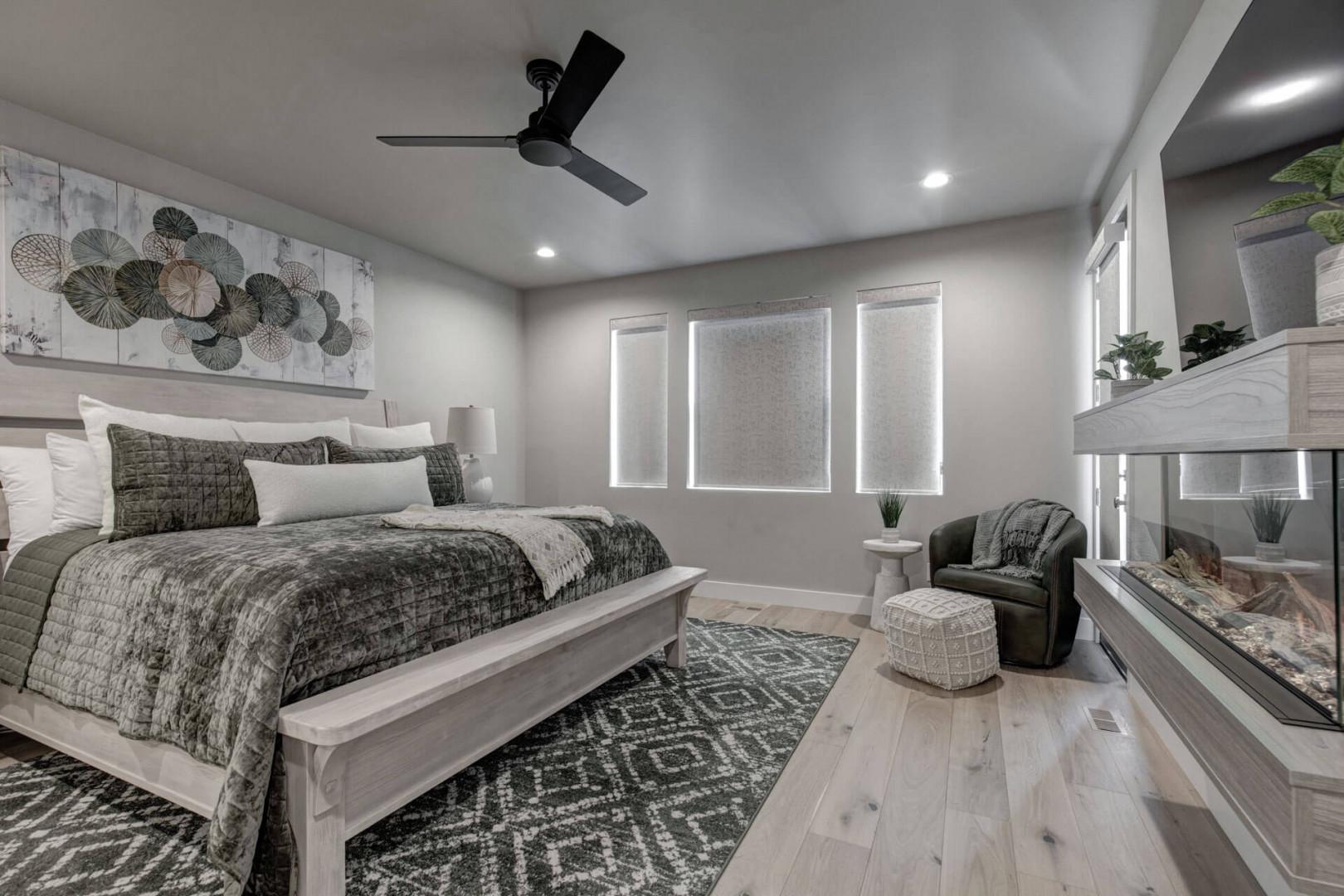 Sink into plush bedding and coastal-inspired textures in this beautifully designed bedroom. Soft lighting, modern décor, and a peaceful color palette create the perfect retreat for restful nights.