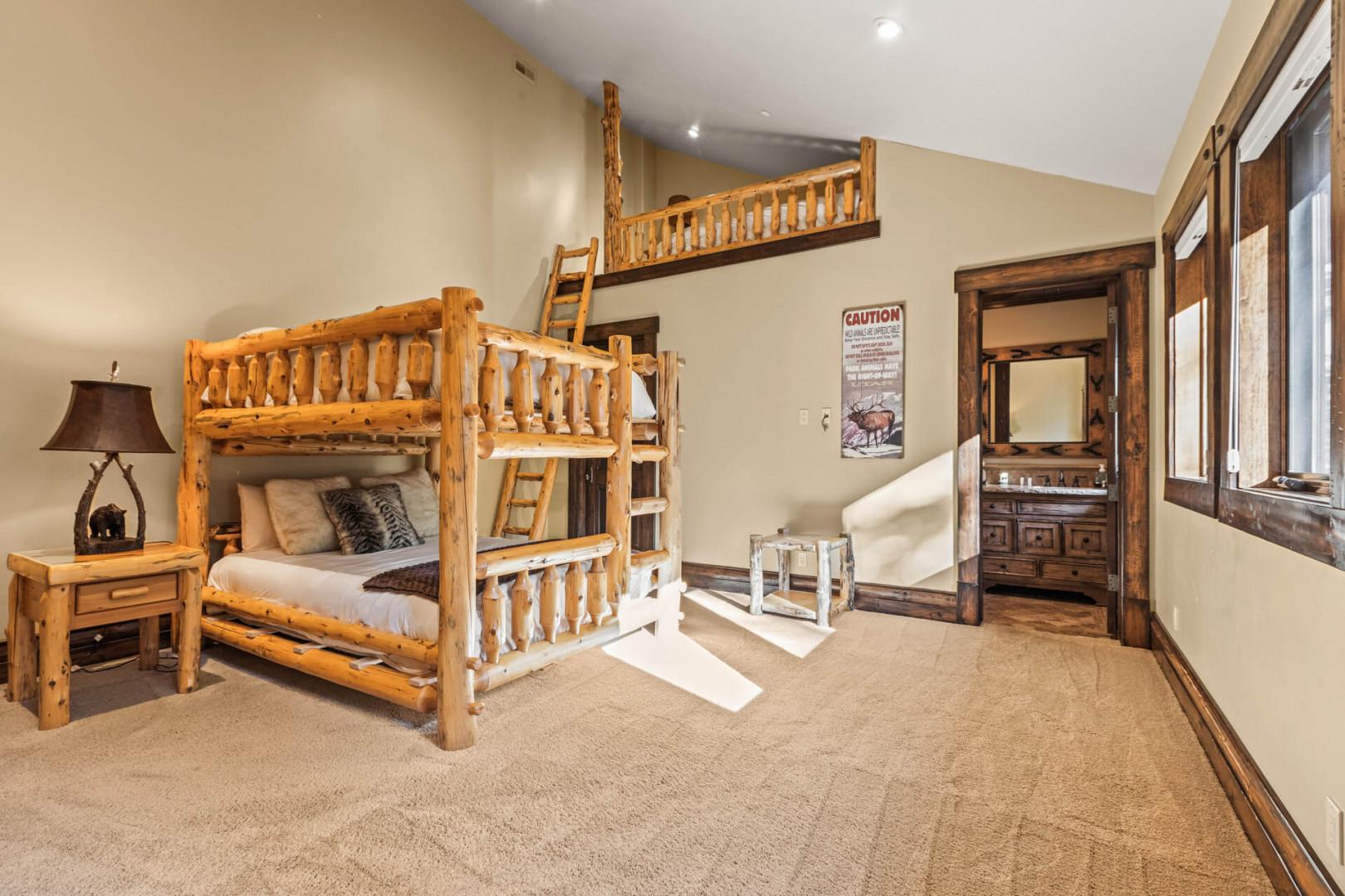 Bunk bed and loft bed, bathroom: "Cozy sleeping space with a view.