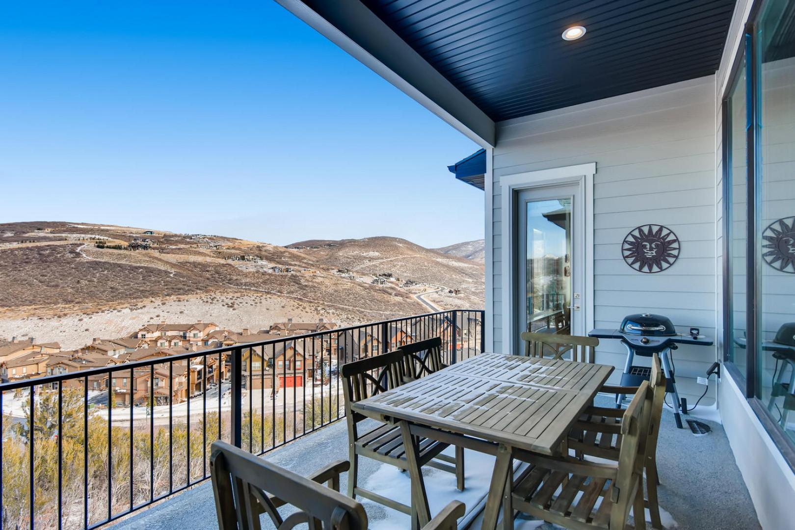 Jordanelle Estates 13299: Outdoor Patio: "Inviting space with a cozy table and chairs for al fresco dining."