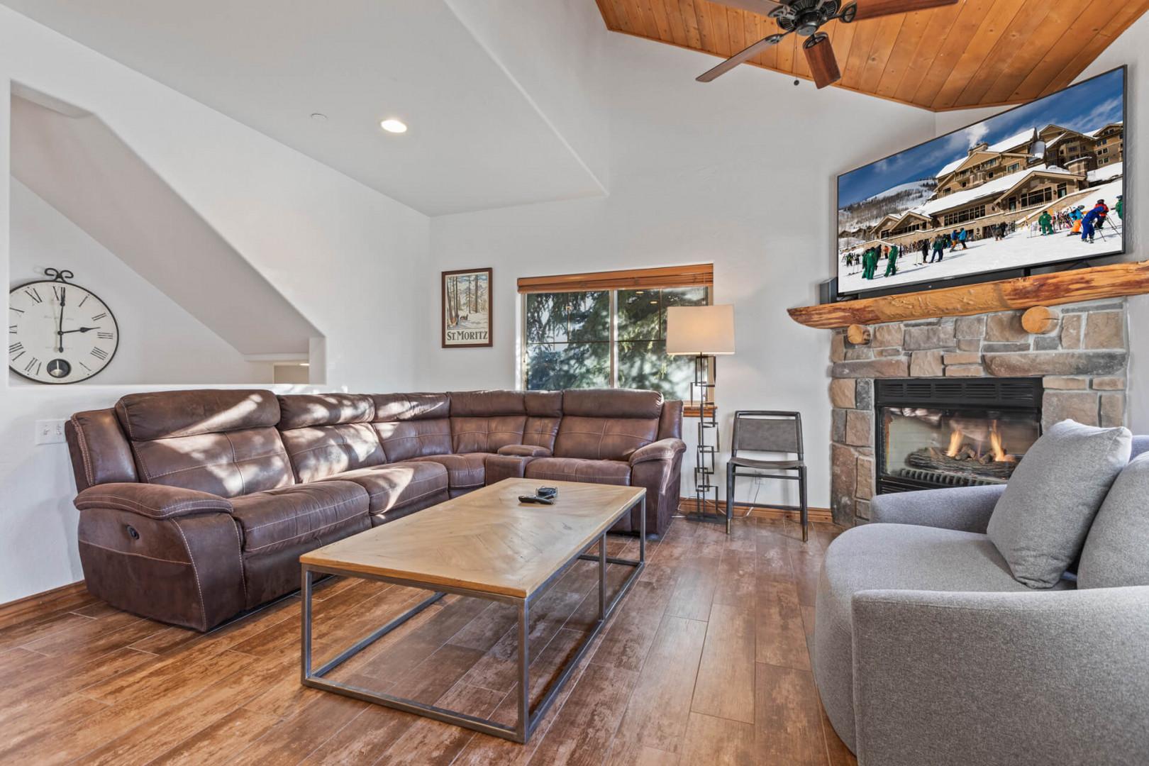 Bear Hollow 5482 "Cozy space with a sofa set, center table, and fireplace ambiance."