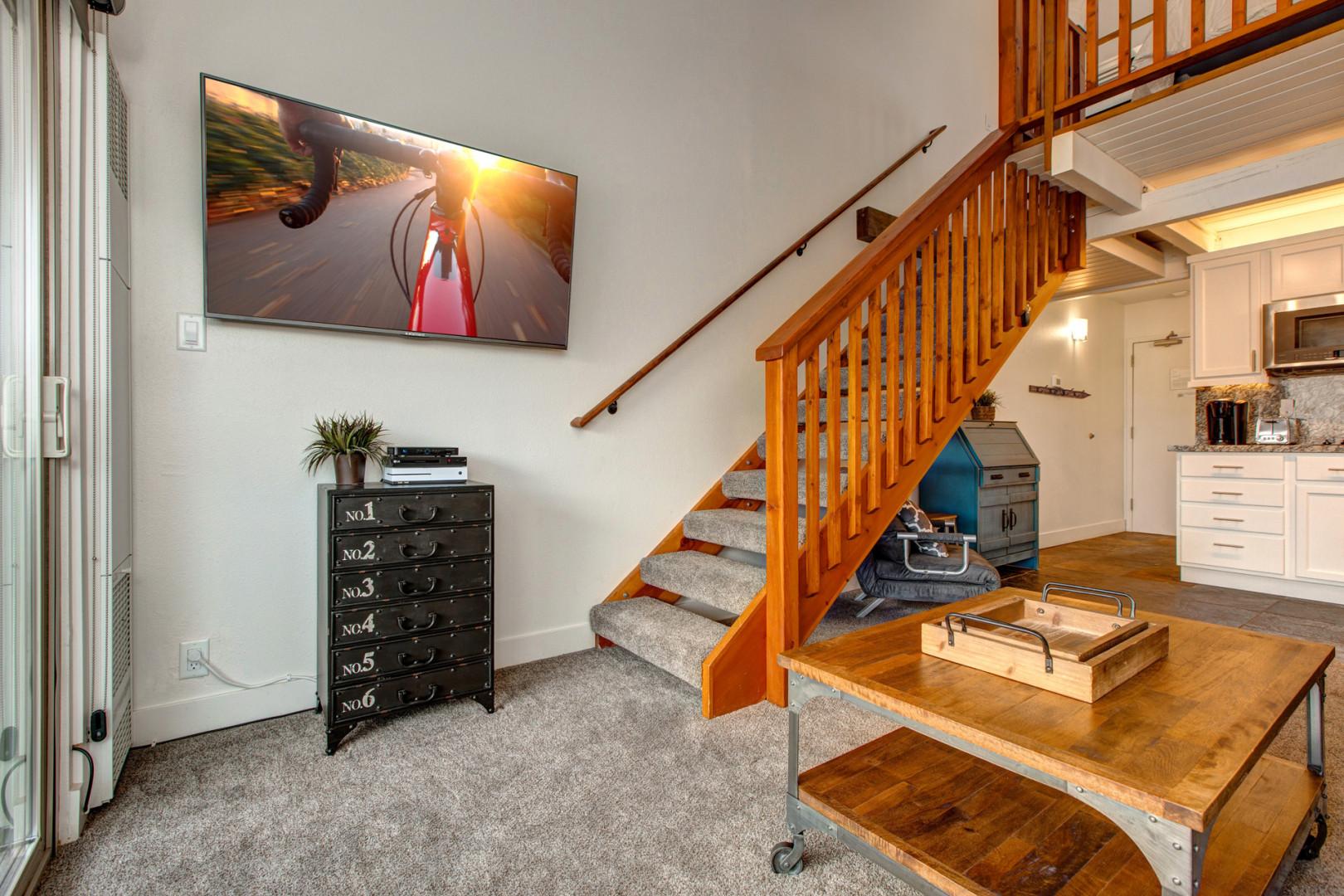 Stairs leading up to the cozy loft space.