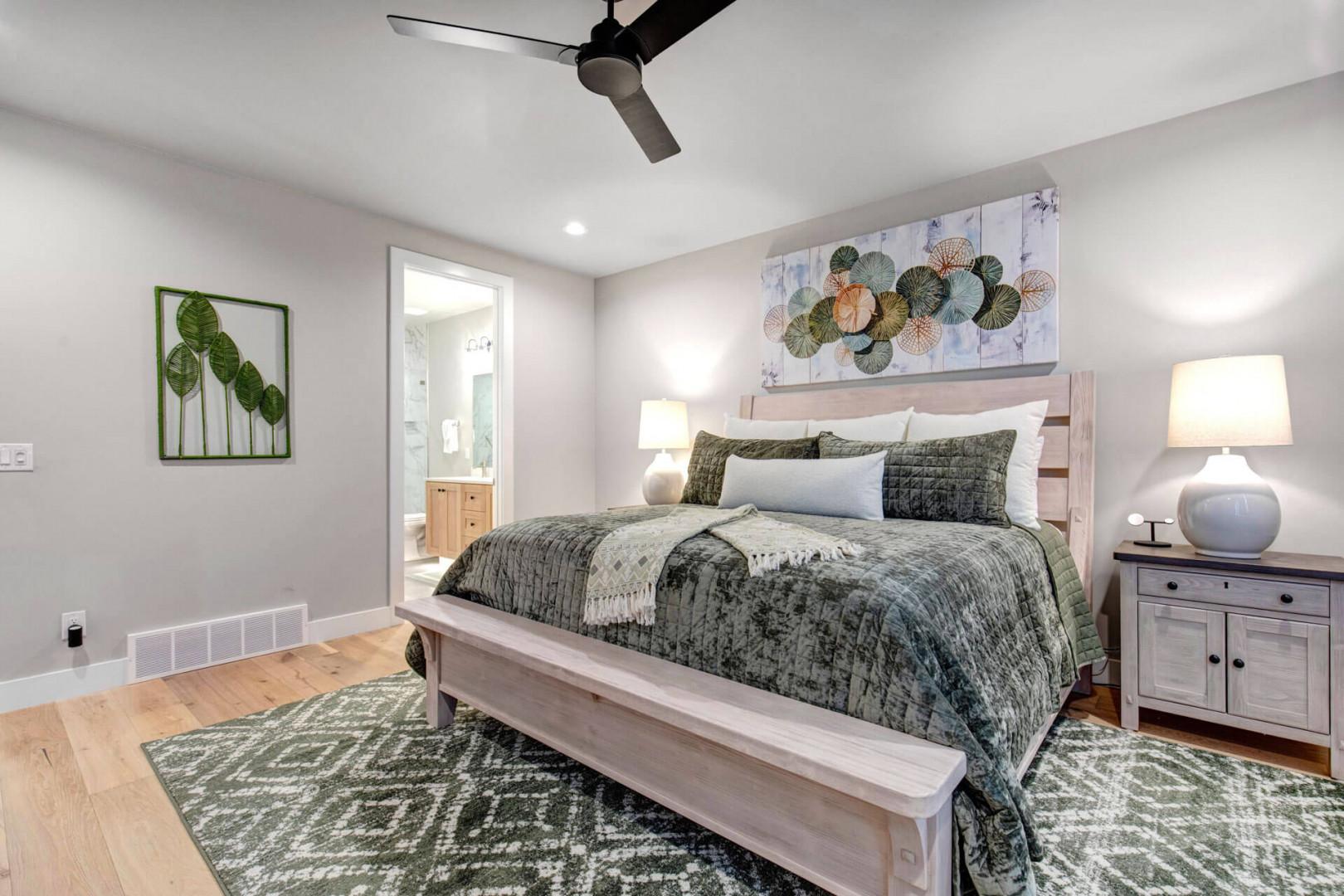 Unwind in your serene bedroom with plush bedding, soft lighting, and a calming color palette that invites restful sleep.