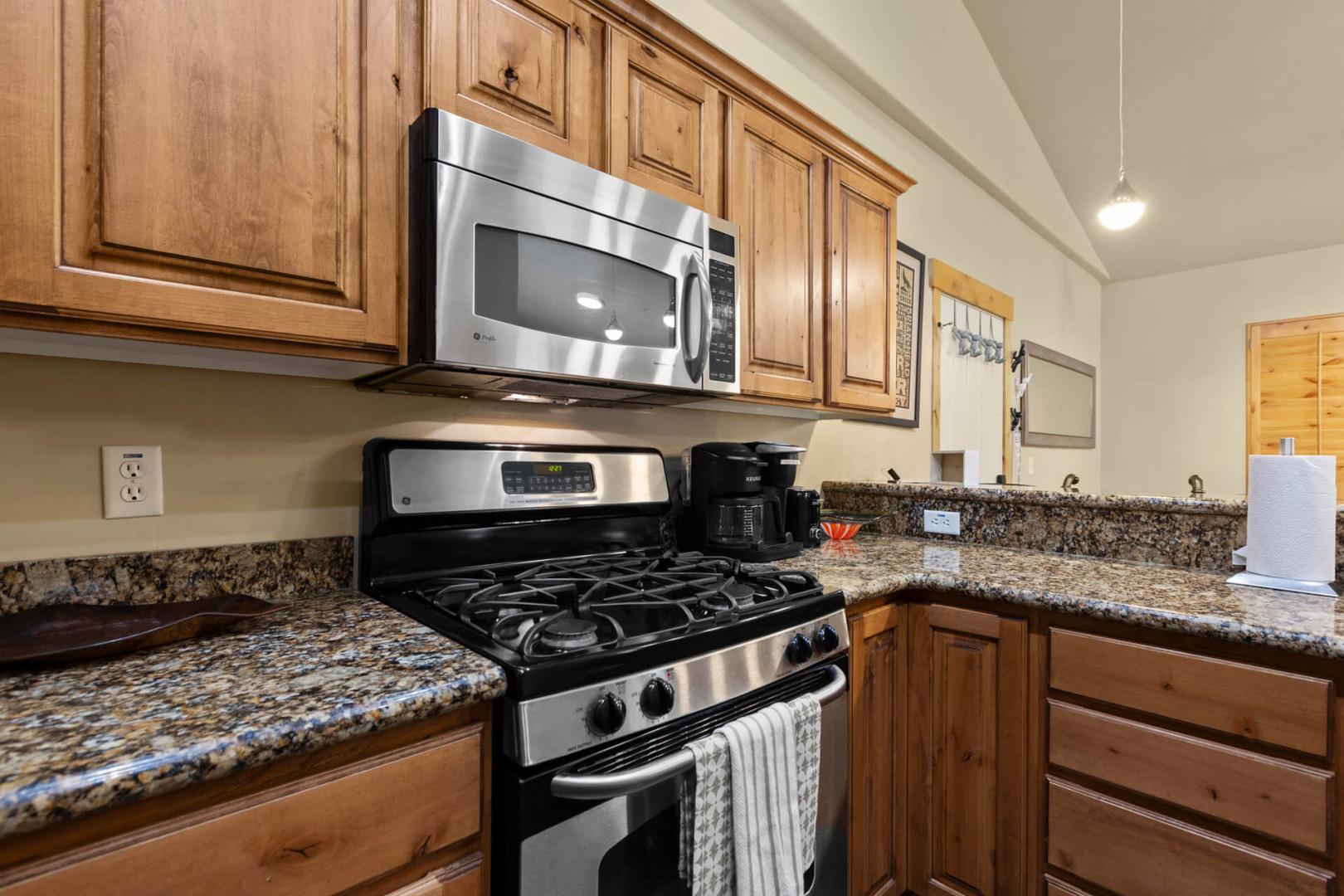 Bear Hollow 1404: Sleek gas range adding charm to the contemporary culinary space.