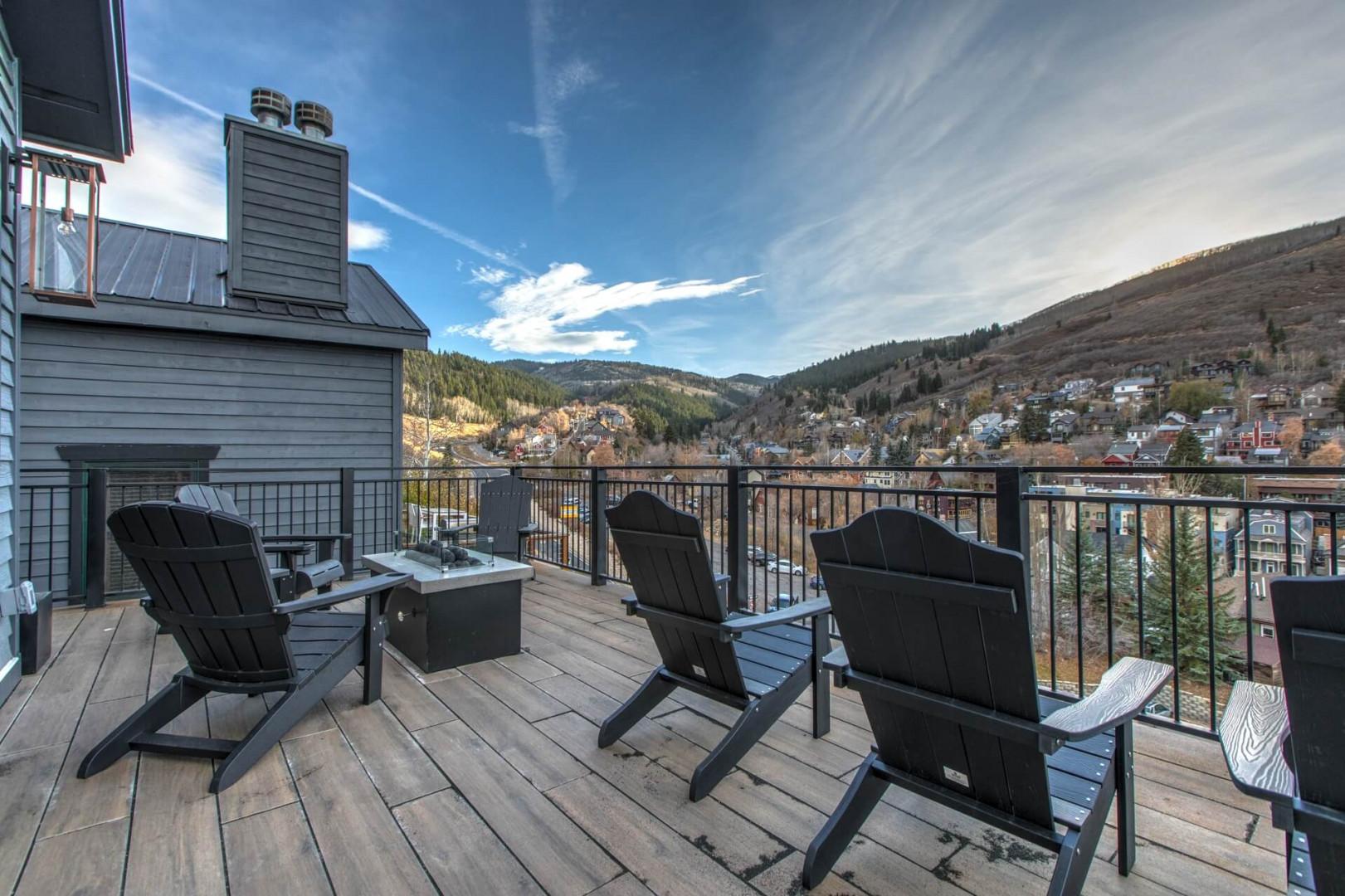 Outdoor Patio: "Serene view of mountains and charming neighborhood from your cozy retreat.