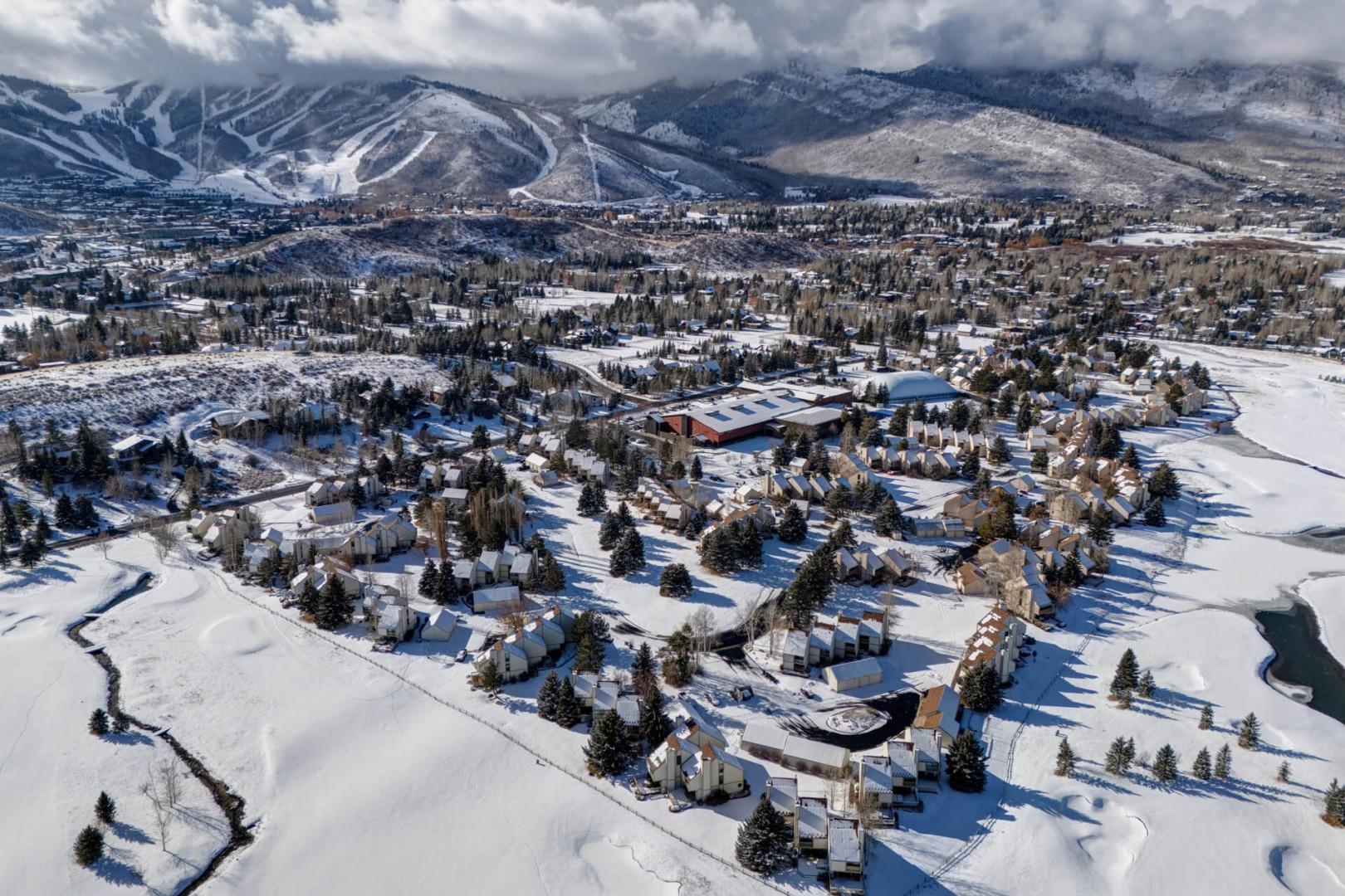 Aerial view of the snow-covered mountain community of Racquet Club in Park City, UT