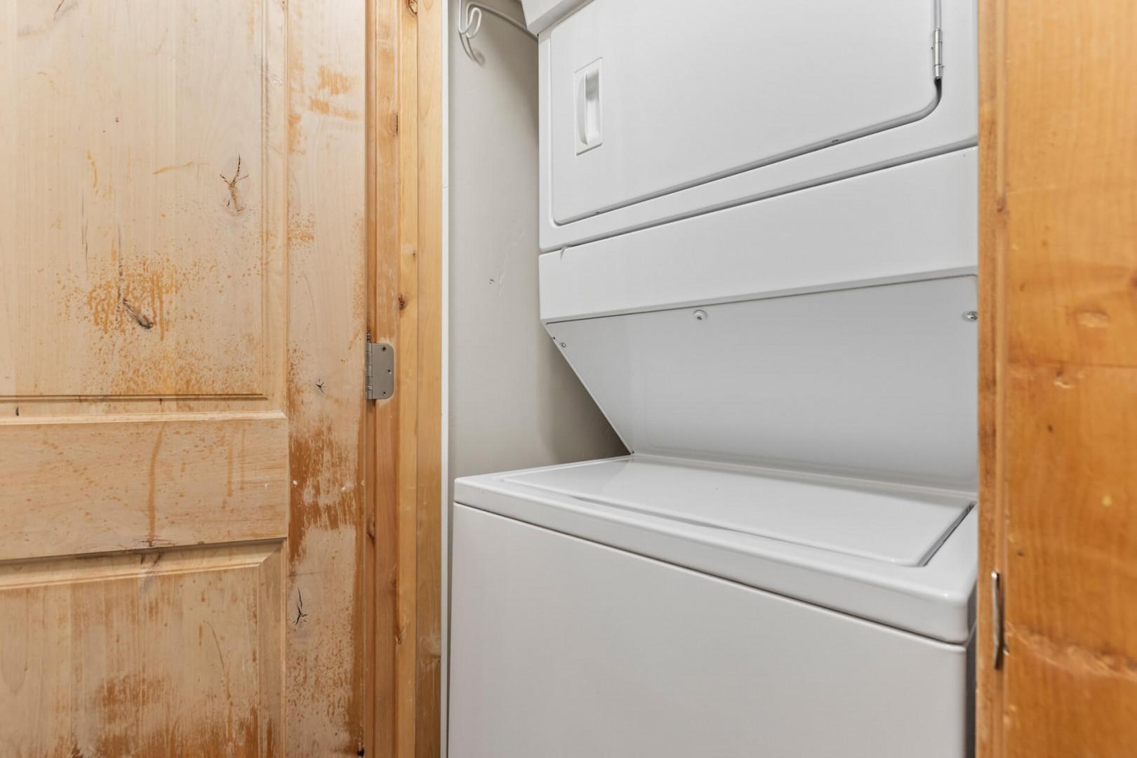 Bear Hollow Lodges 4102: LAUNDRY NOOK with a stacked washer and dryer can both be easily accessed from the hallway.