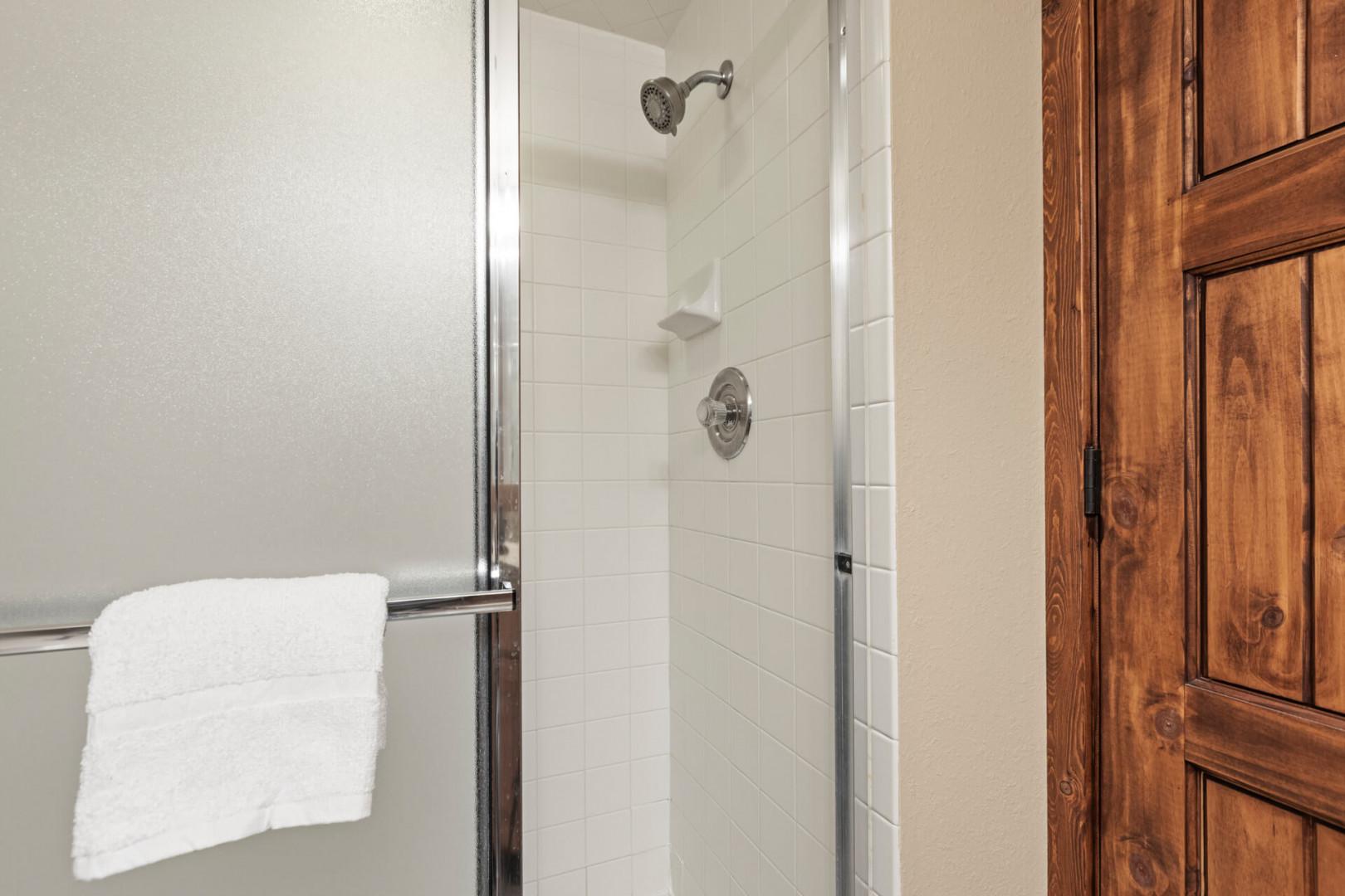 Powderwood 11C: Sleek and modern shower space with luxurious amenities.