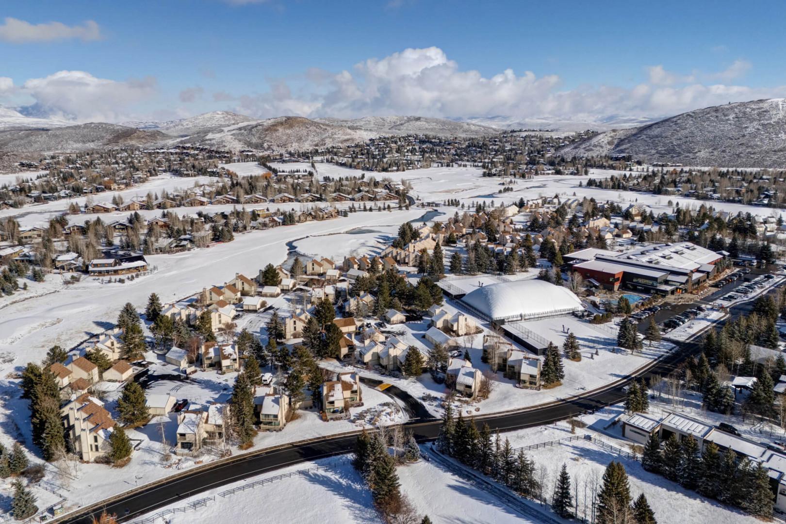 Aerial view of the snow-covered mountain community of Racquet Club in Park City, UT