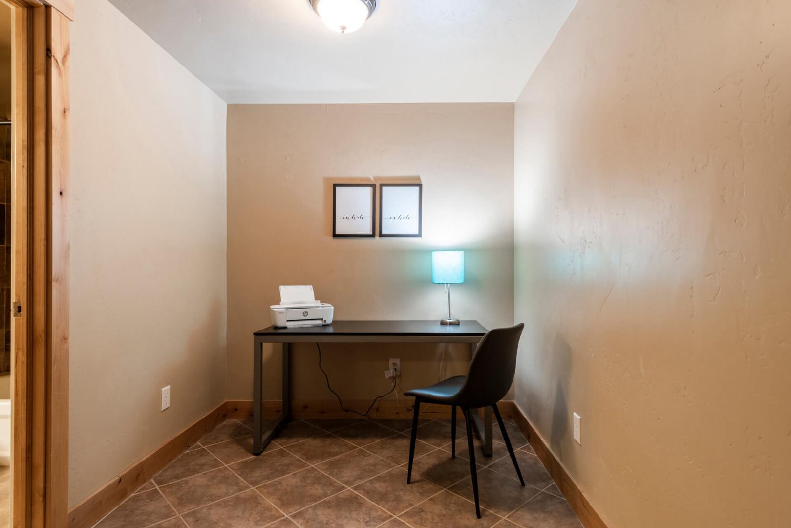 Bear Hollow 5557: Cozy workspace with desk, table, printer, and stylish lamp shade.