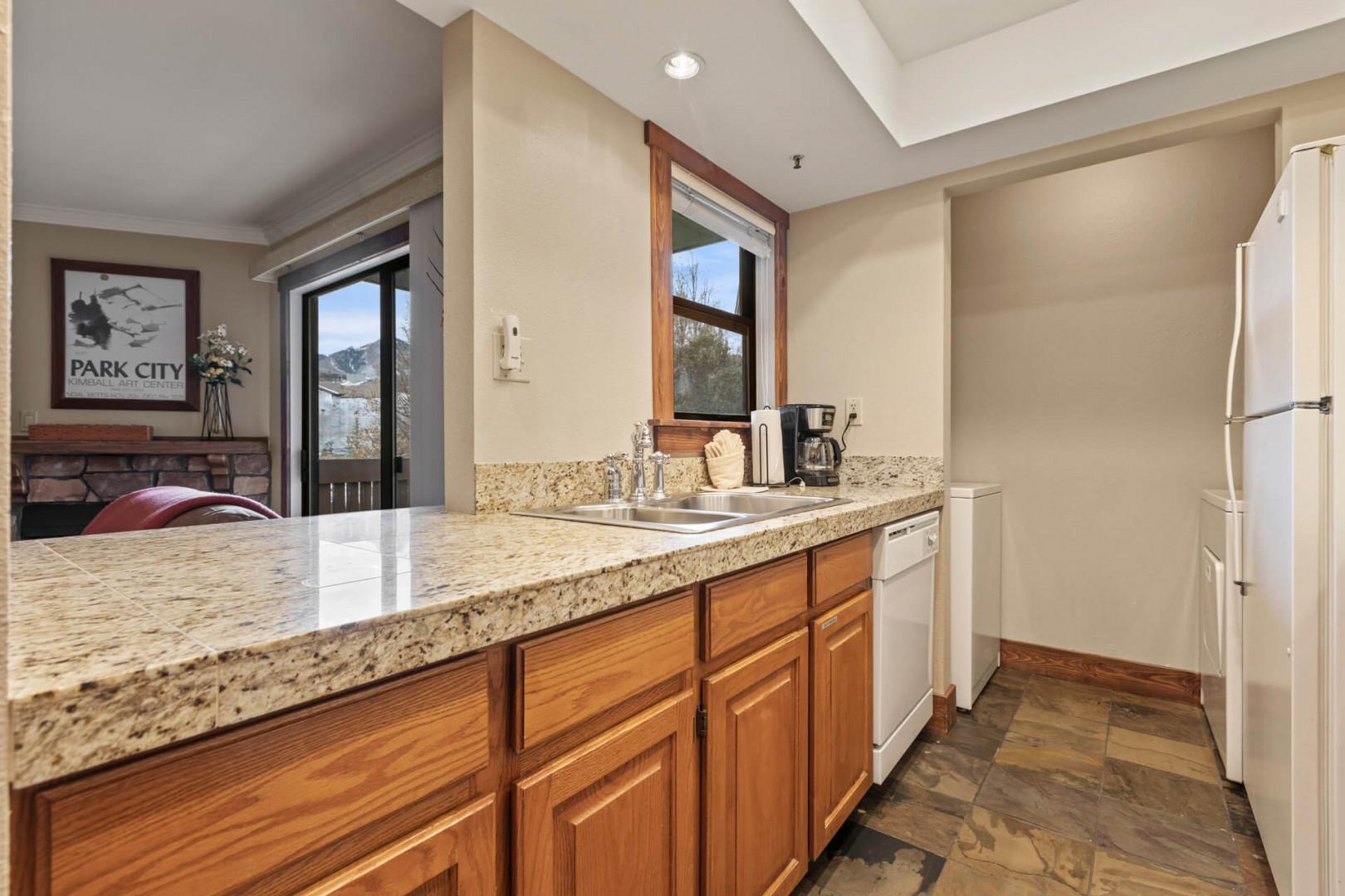 Powderwood 11C: Sleek counter with a coffee maker, perfect for morning brews.