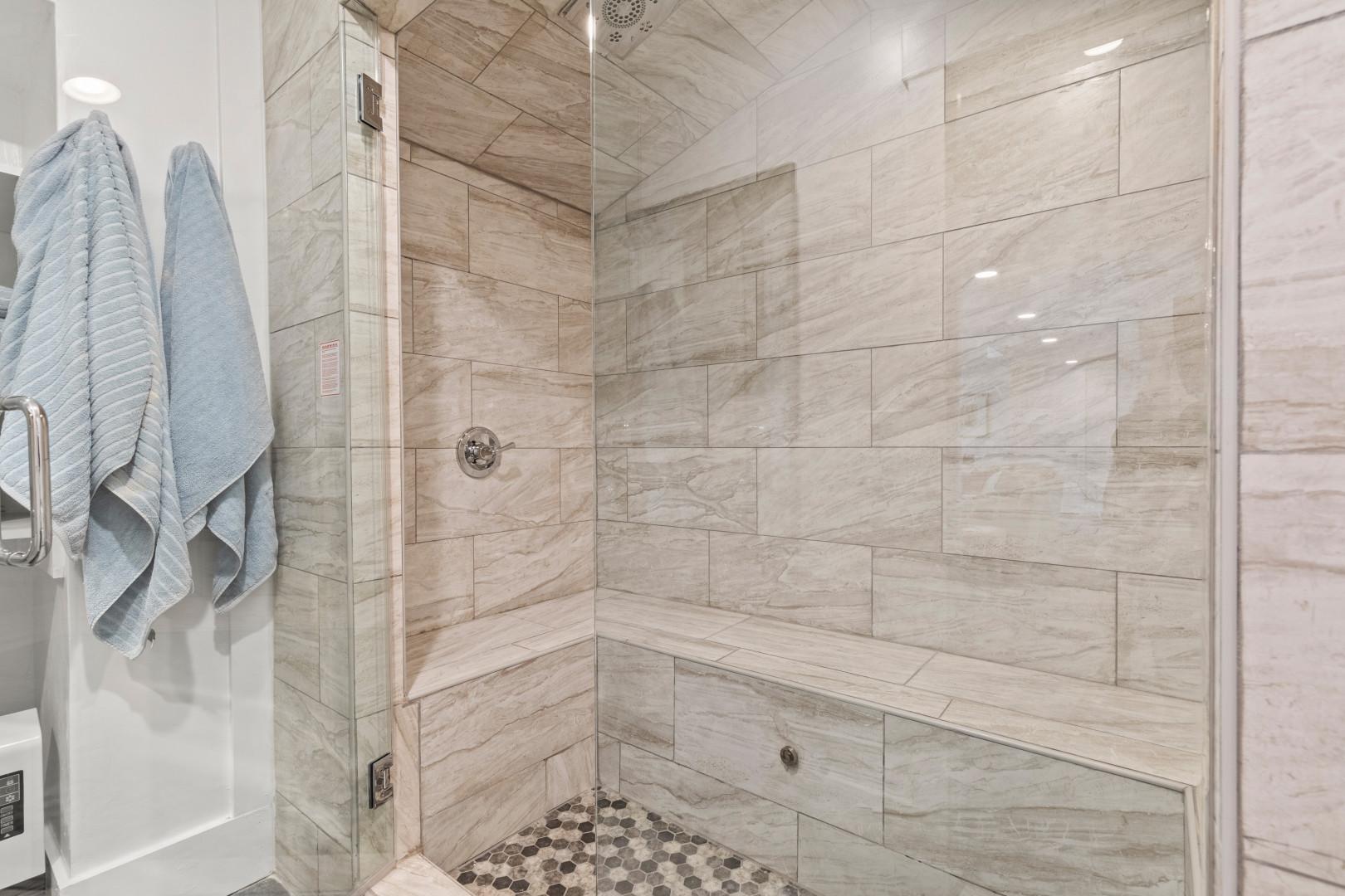 Deer Springs 12797: Modern shower with sleek glass enclosure, a perfect oasis for relaxation.