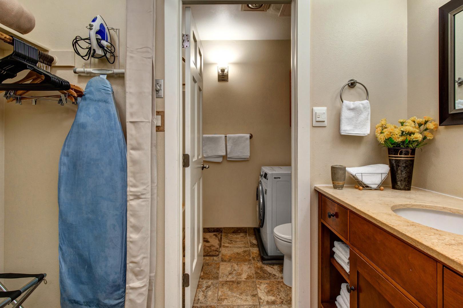 Convenient amenities for washing and cleaning in this cozy space.