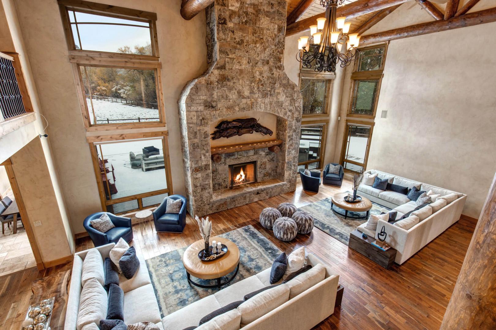 Living Room: "Modern design with cozy fireplace and abundant natural light."