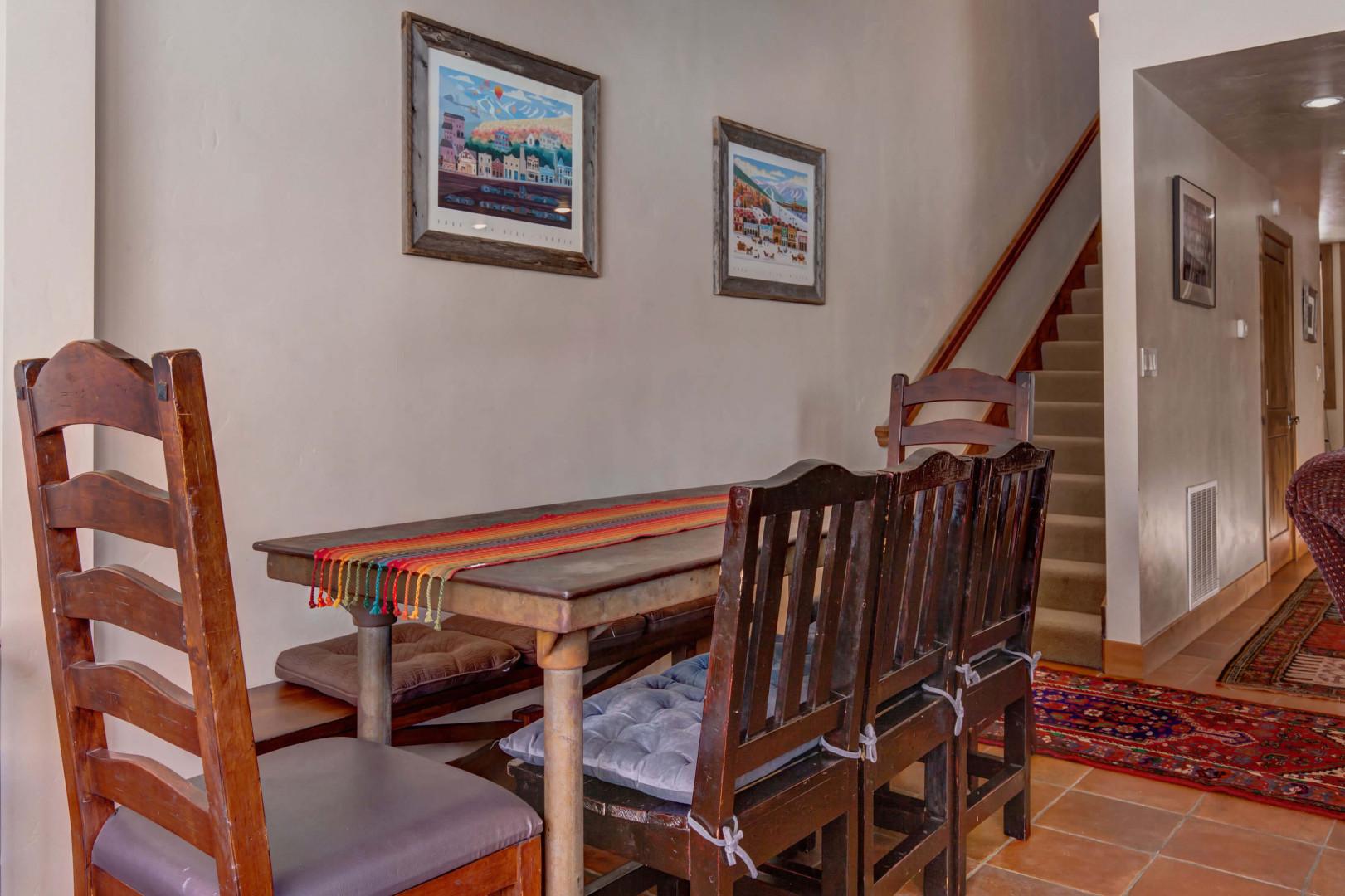 Rustic charm with spacious wood table and cozy chairs. for eight.